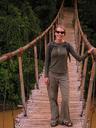 Ashe, camouflaged in her new green t-shirt, on the swinging bridge.